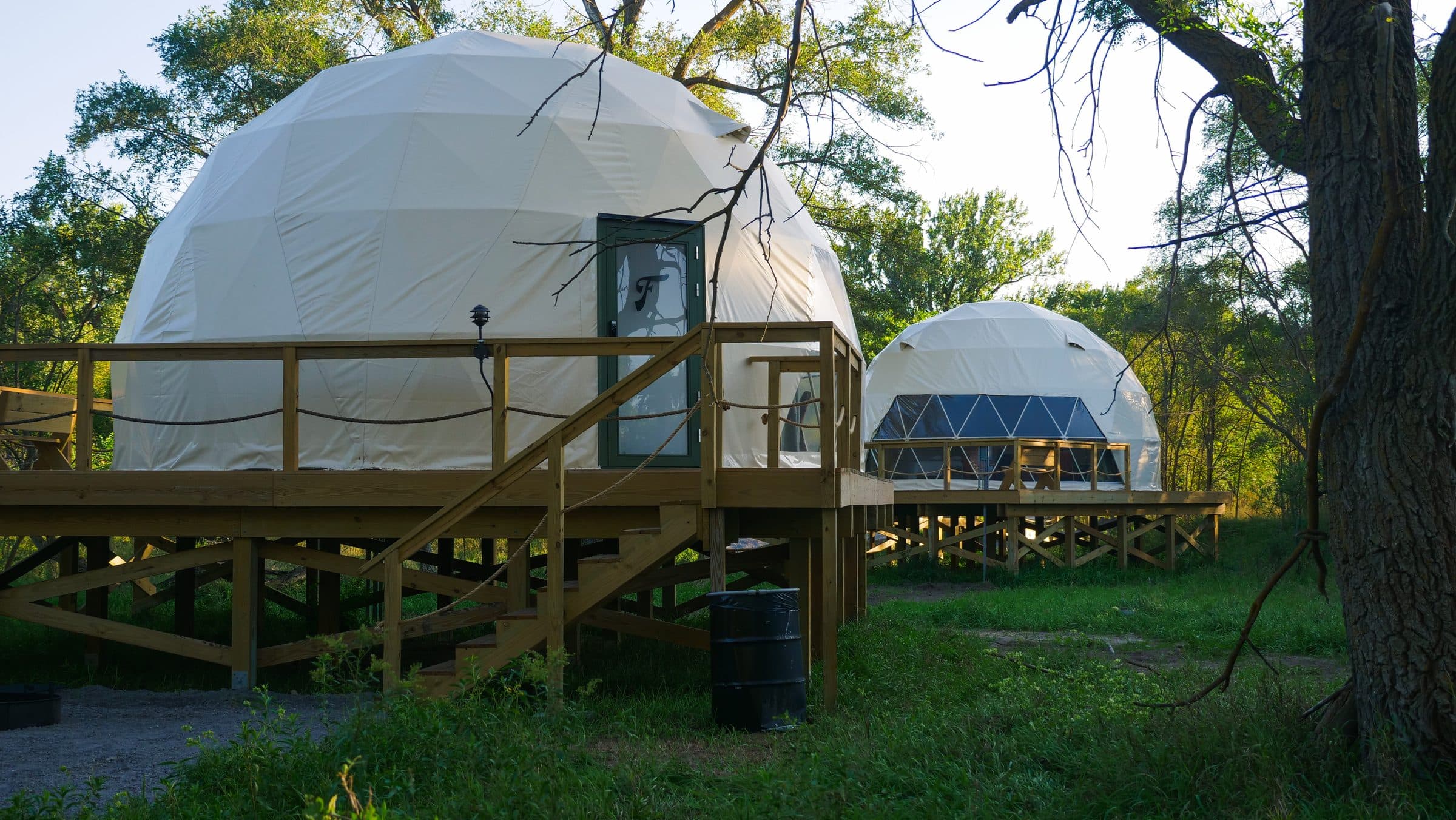 Two domes on their decks in the evening light