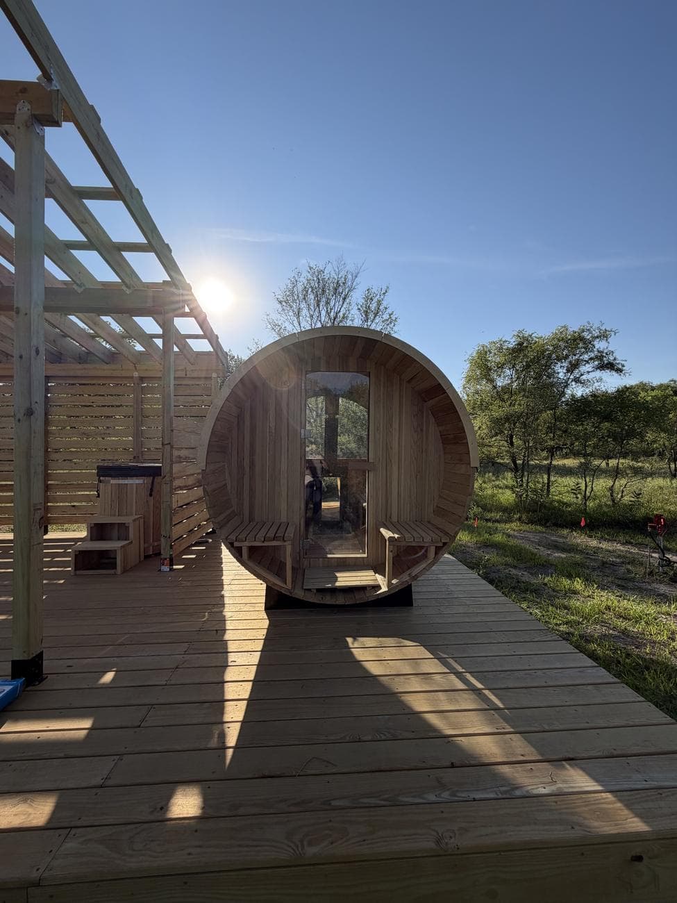 Barrel sauna on a wooden deck