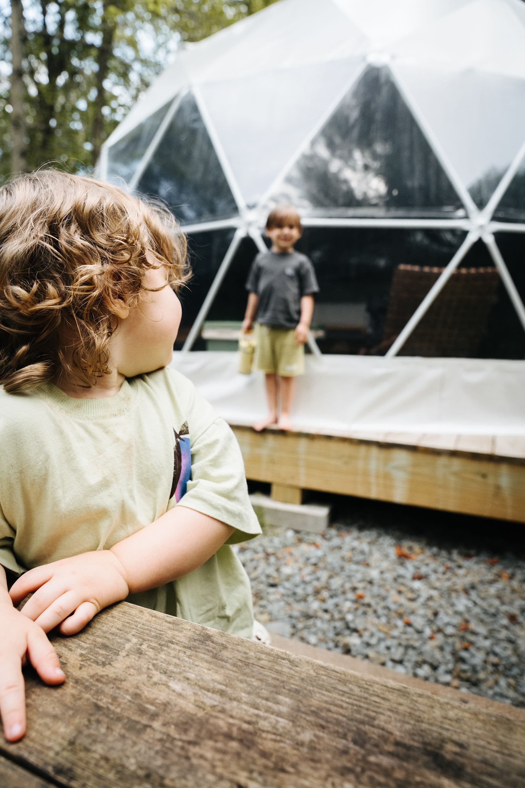 Kids playing near a Ferncrest dome