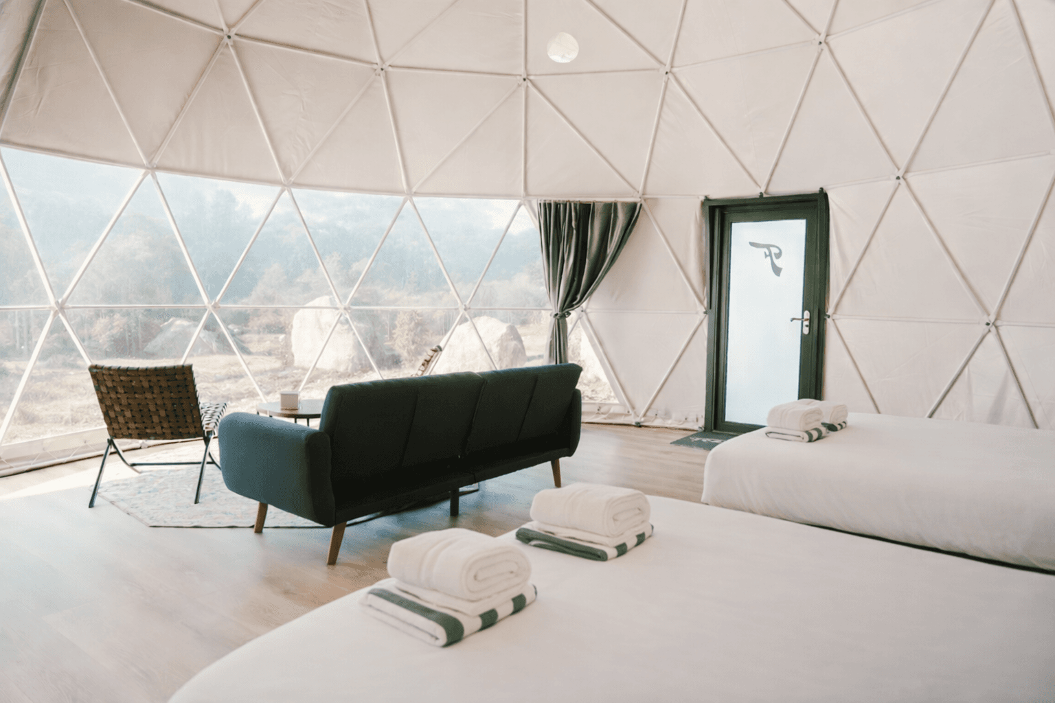 Seating area inside Dome 1 at Ferncrest Acadia