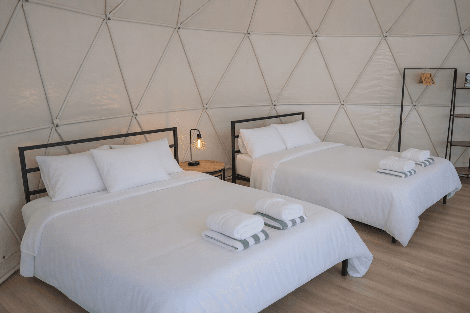 Double queen beds inside a dome at Ferncrest Acadia