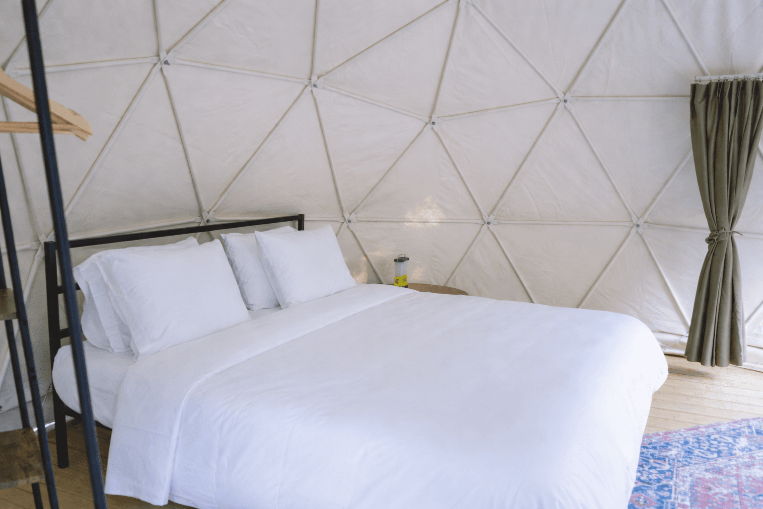 King bed inside a dome at Ferncrest Acadia