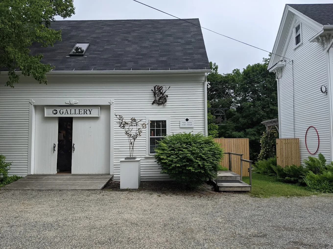 A white clapboard art gallery on Deer Isle