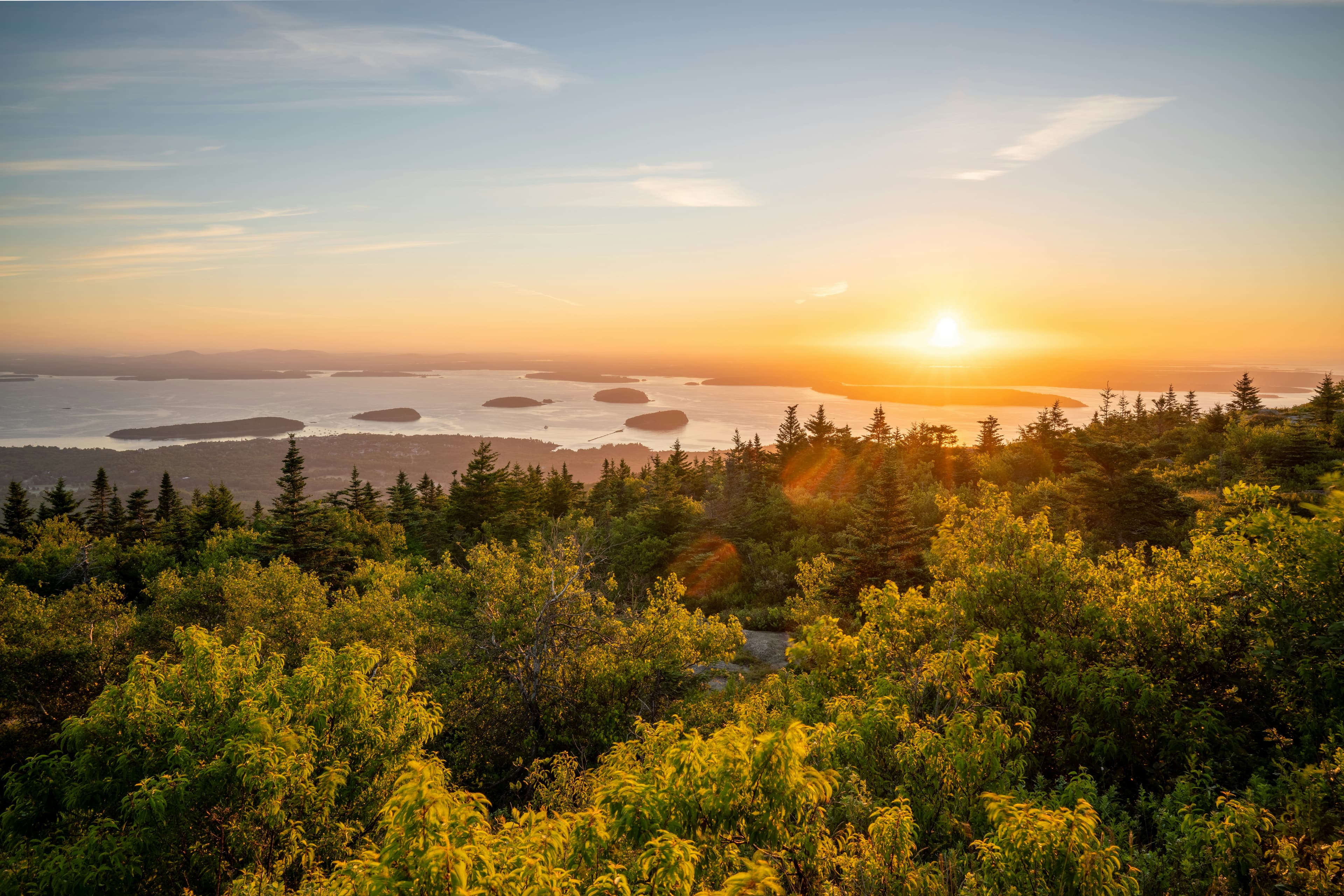 First light over the bay and islands from the Cadillac Mountain summit