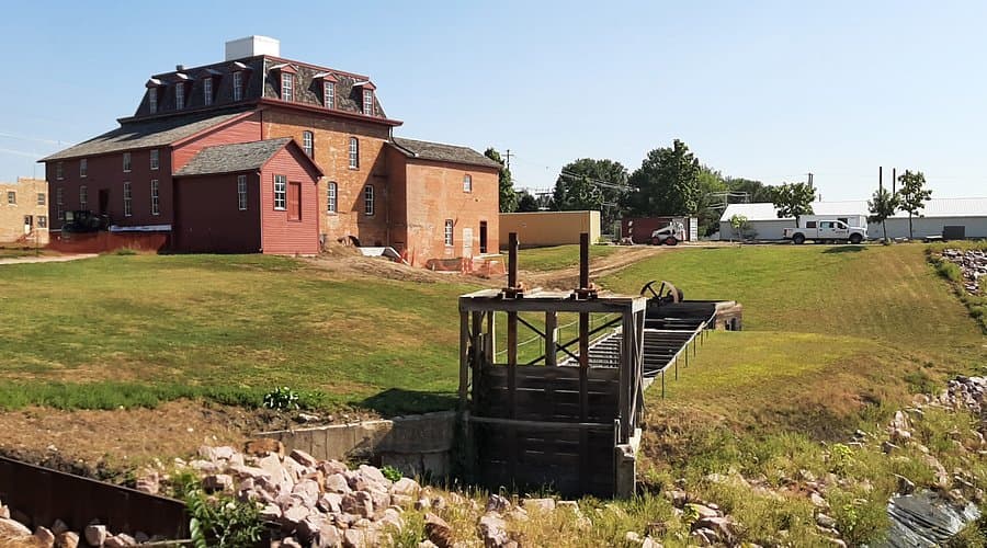 The brick Neligh Mill and its millrace