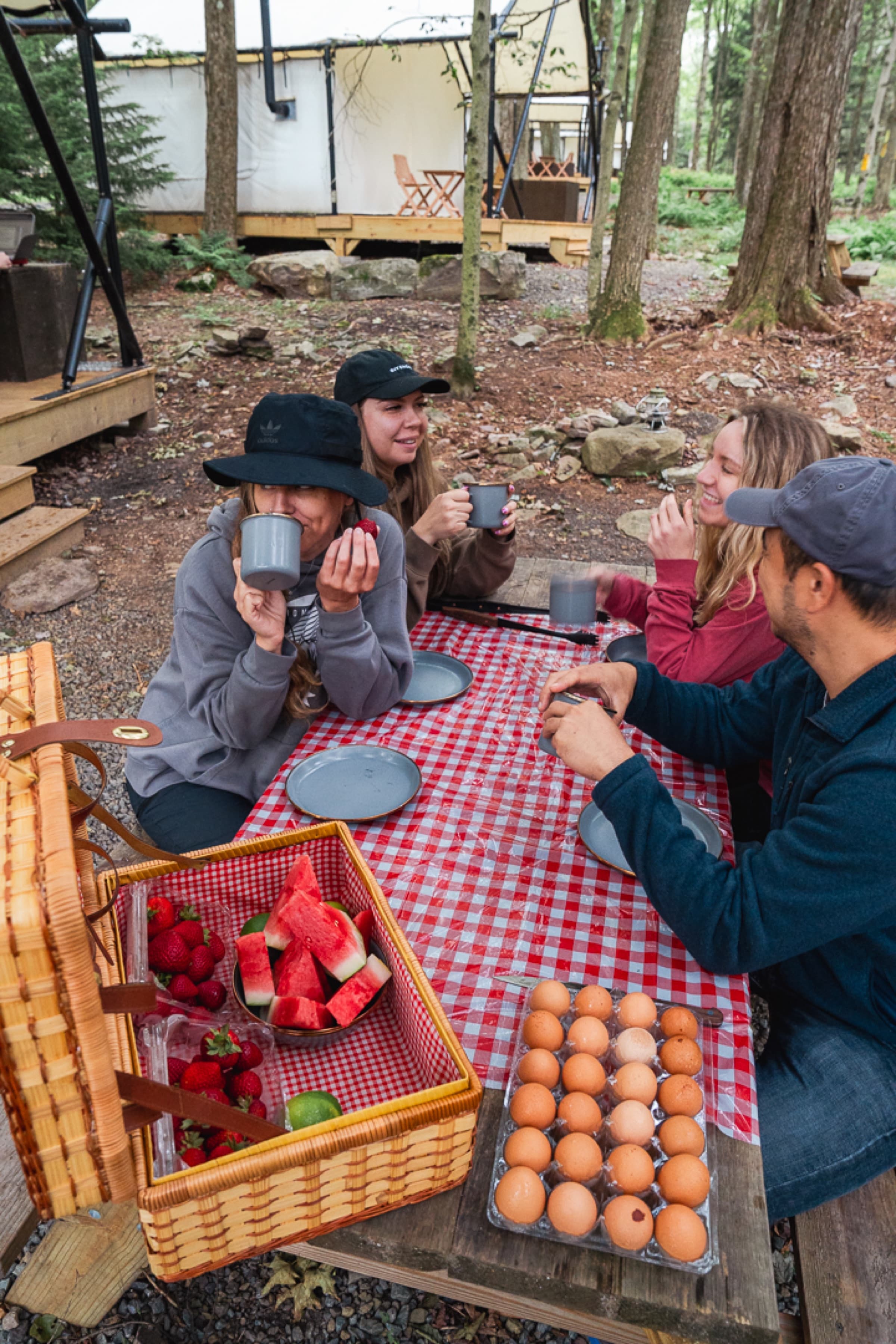 Friends gathered around the fire at Ferncrest Promised Land